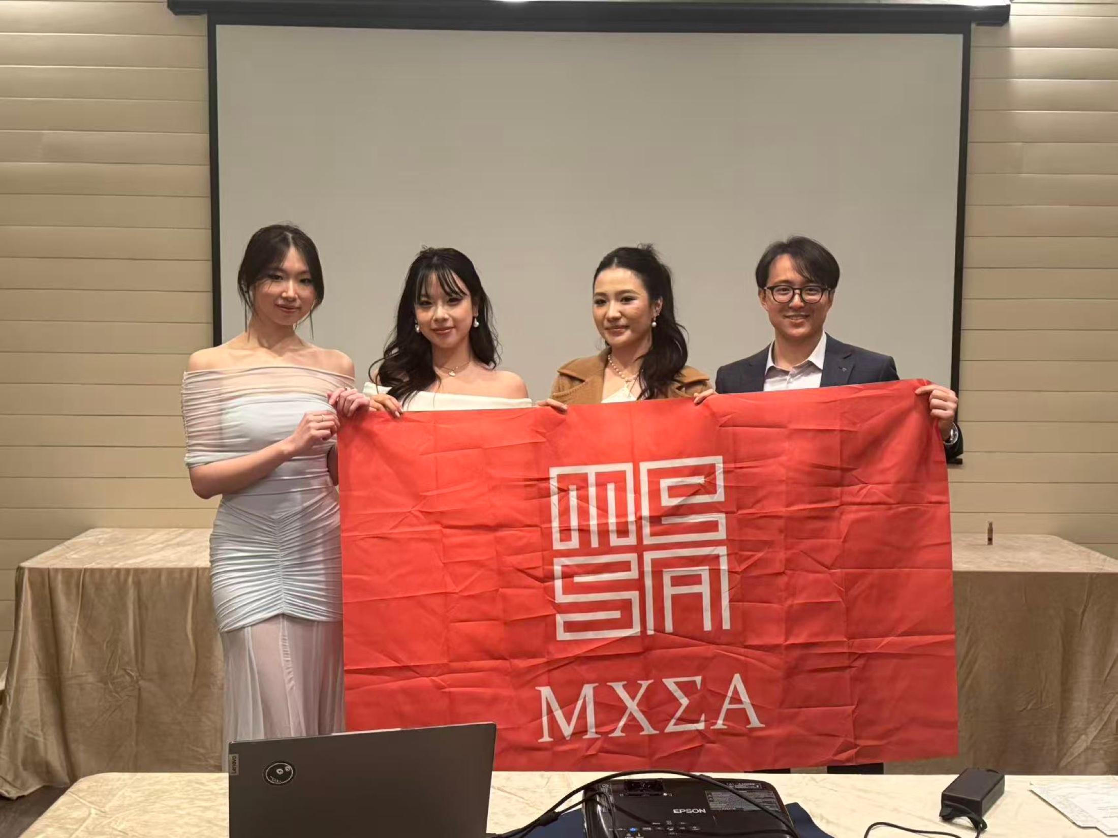 Members holding an MCSA banner